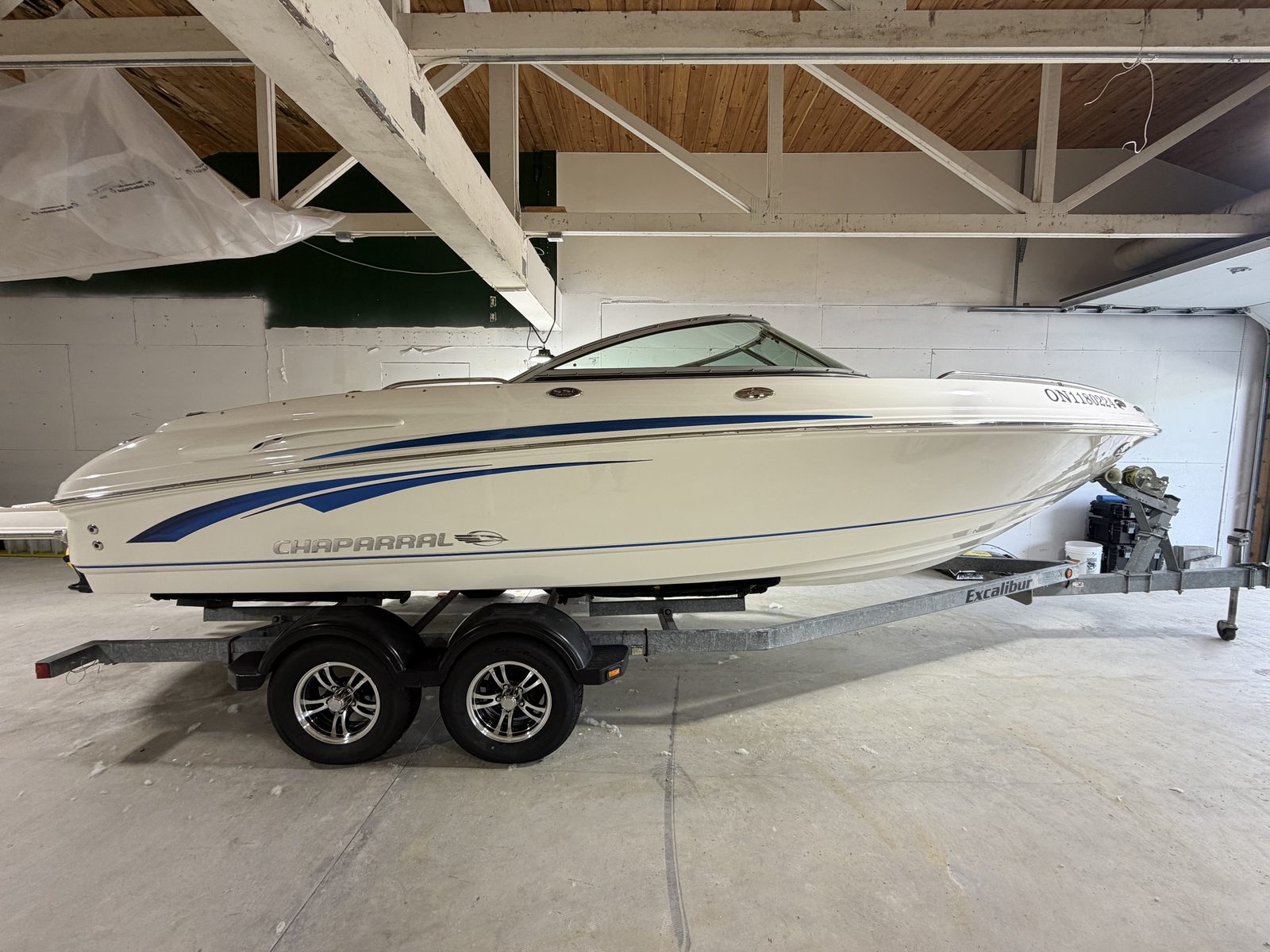 Freshly detailed Chaparral bowrider on a trailer in the Boatworks shop
