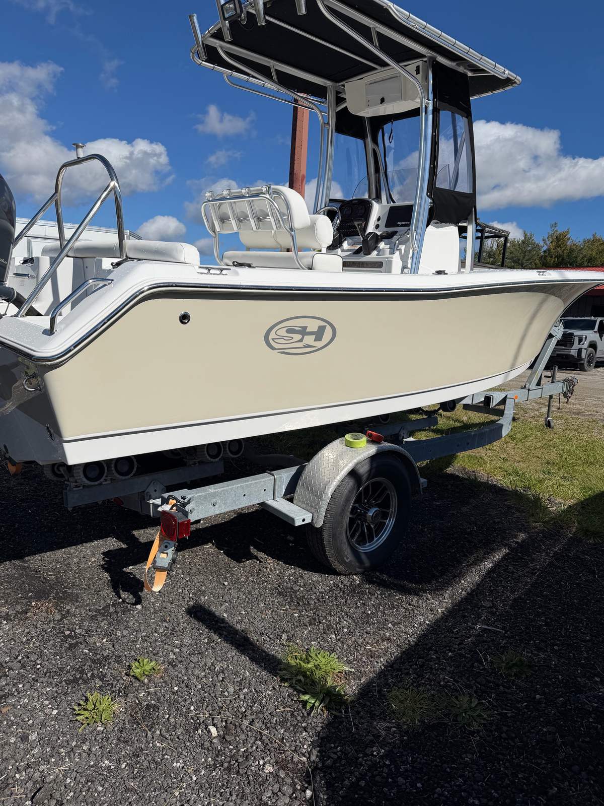 The same Sea Hunt center console with a clean, restored hull